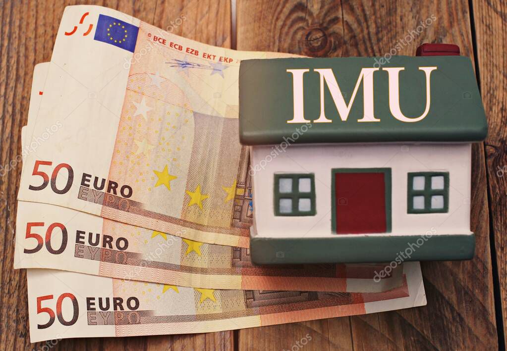 Calcolo delle imposte IMU e TARI su un immobile